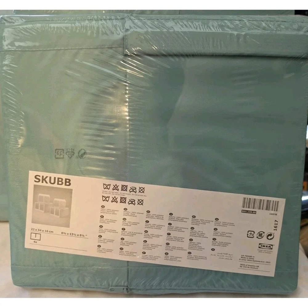 Brand new sealed IKEA SKUBB storage boxes, set of 4. Light teal/mint green color